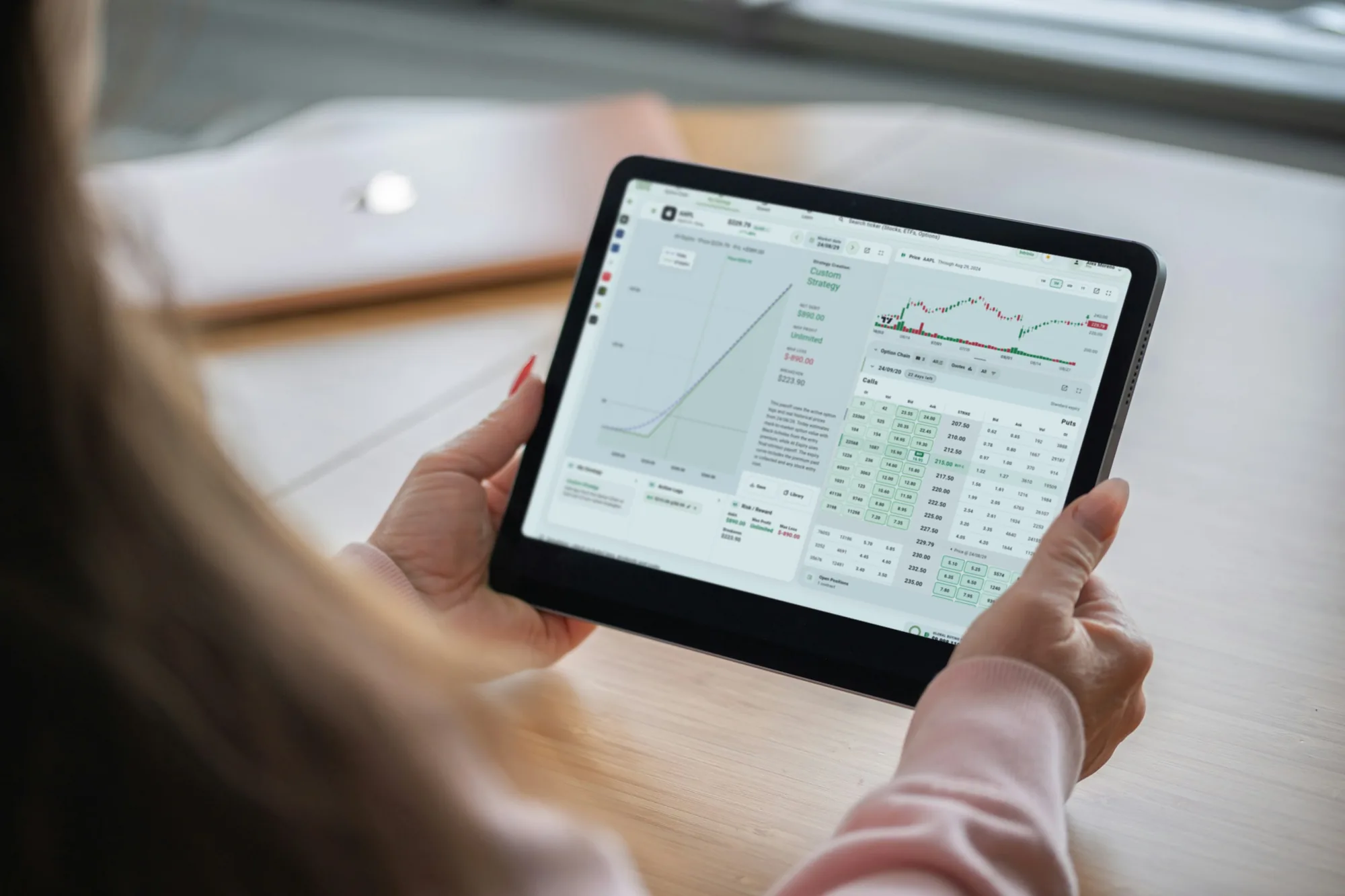 A third person reviews the strategy on a tablet
